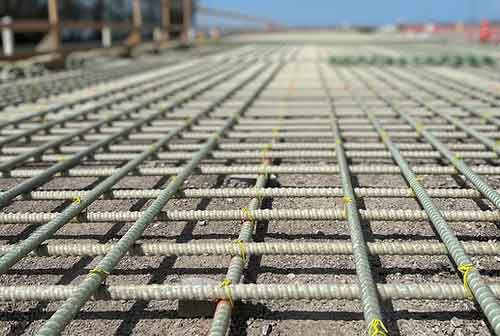 When can fiberglass rebar replace steel rebar?