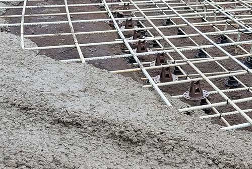 Fiberglass rebar being used in concrete reinforcement