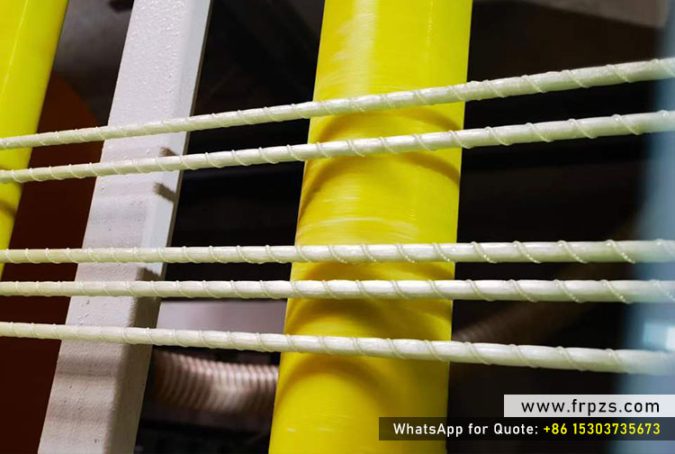 5 continuous helical ribbed GFRP rebars passing through caterpillar haul-off system