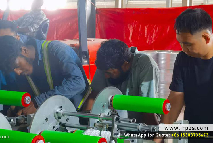 Henan Zhongsheng engineers adjusting roving tensioners on 1-out-of-5 GFRP rebar machine in Bangladesh