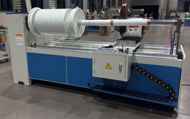 Automatic Fiberglass Mat Roll Slitting Machine Operating in Composite Manufacturing Plant